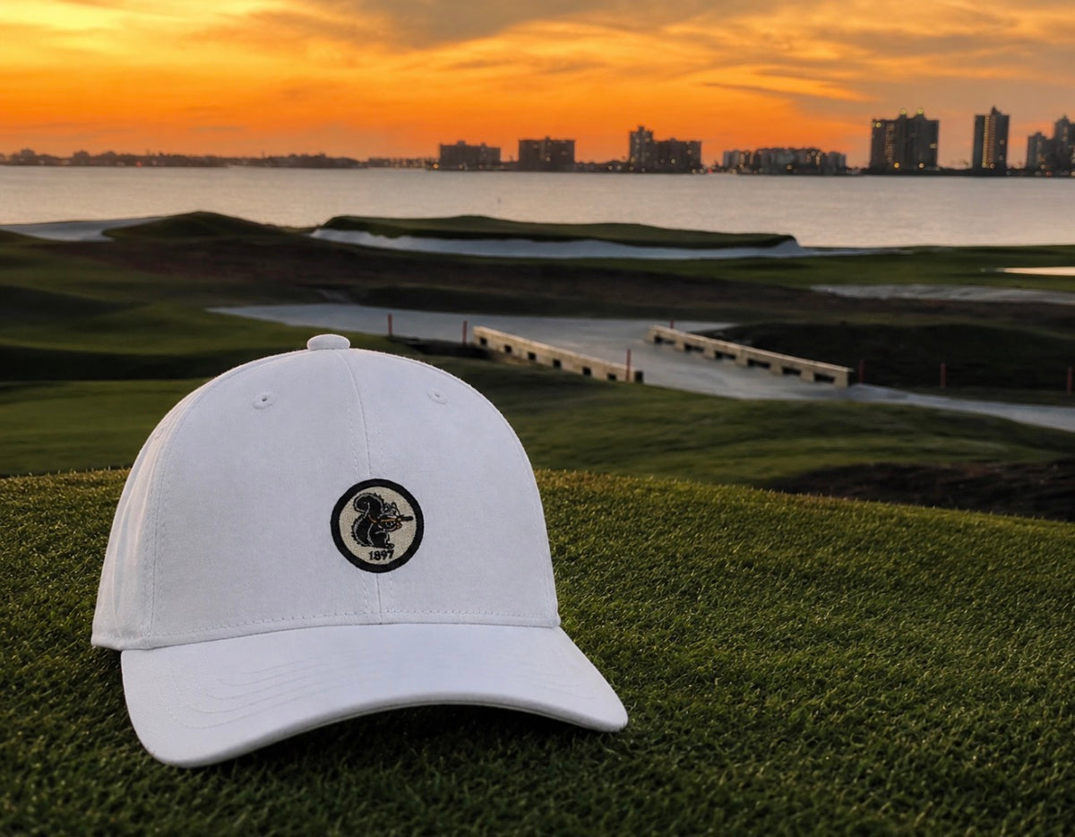 (Pre-Order) The BANNED BELLE on a white mesh back hat (mid to low profile)